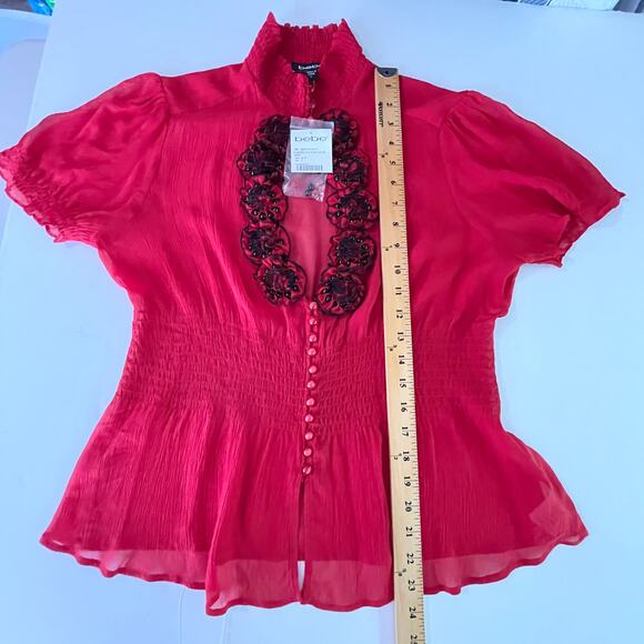Bebe NEW Silk Flower Detail Puff Sleeve Peplum Blouse L Red Beads Smocked Sheer - Picture 8 of 9